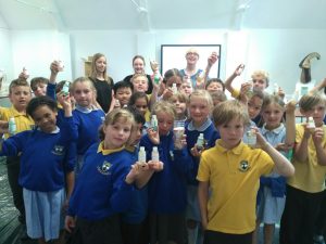 Children from Whitehill School with the bubble bath they made in a science project here